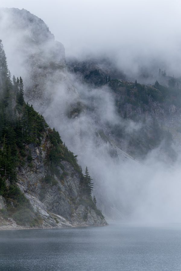 Fog over an alpine lake
